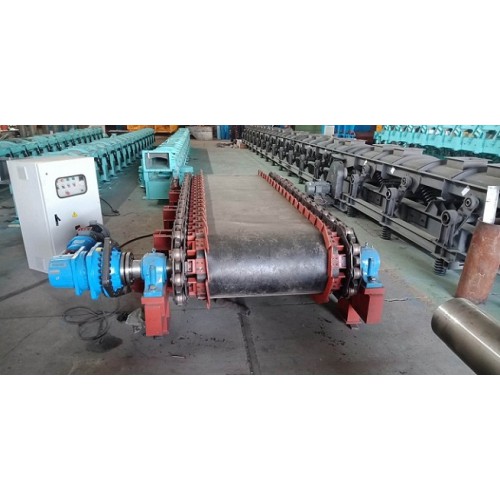 新型粘土板式給料機(jī)頭部清掃裝置